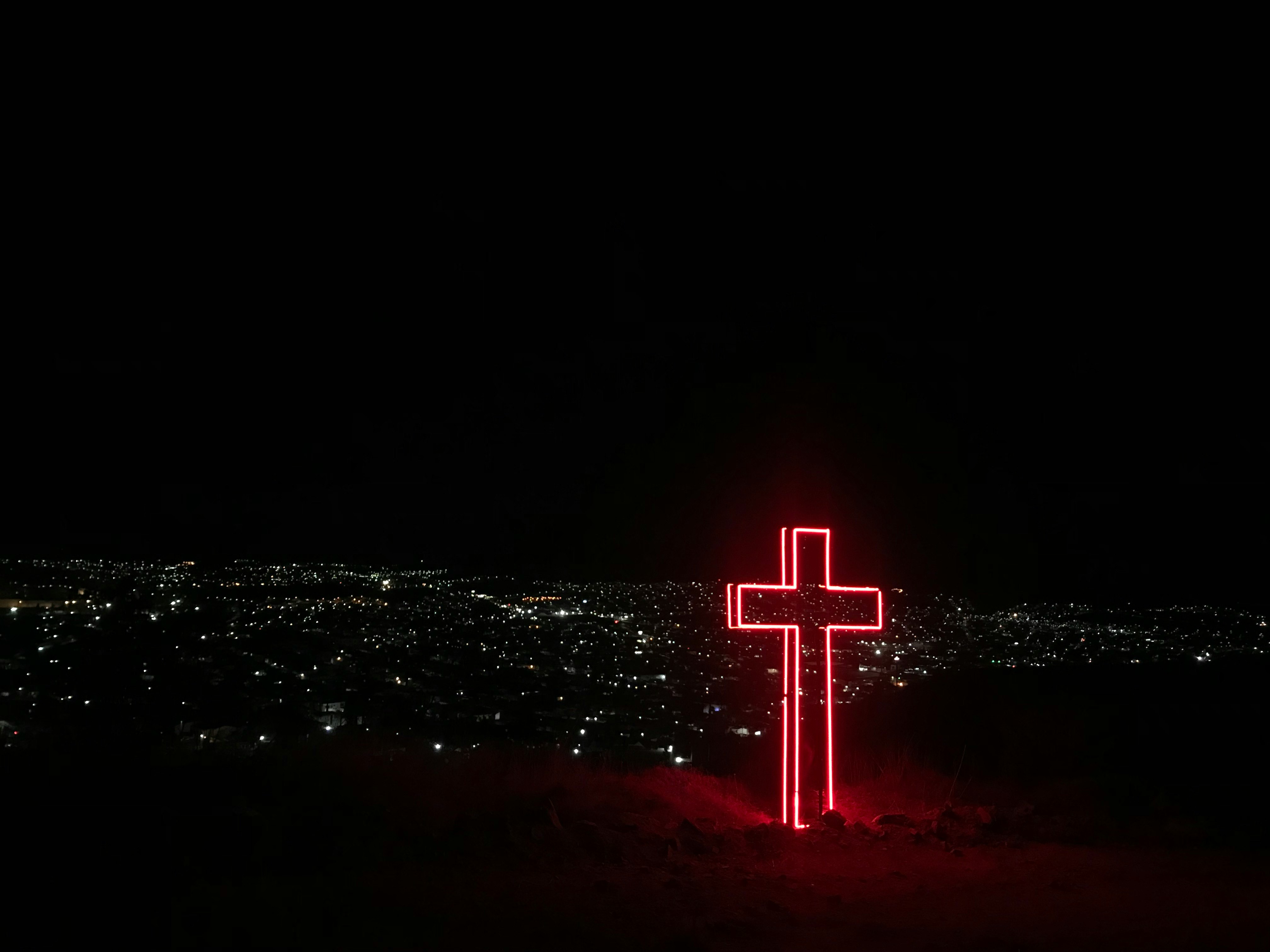 red neon light cross signage